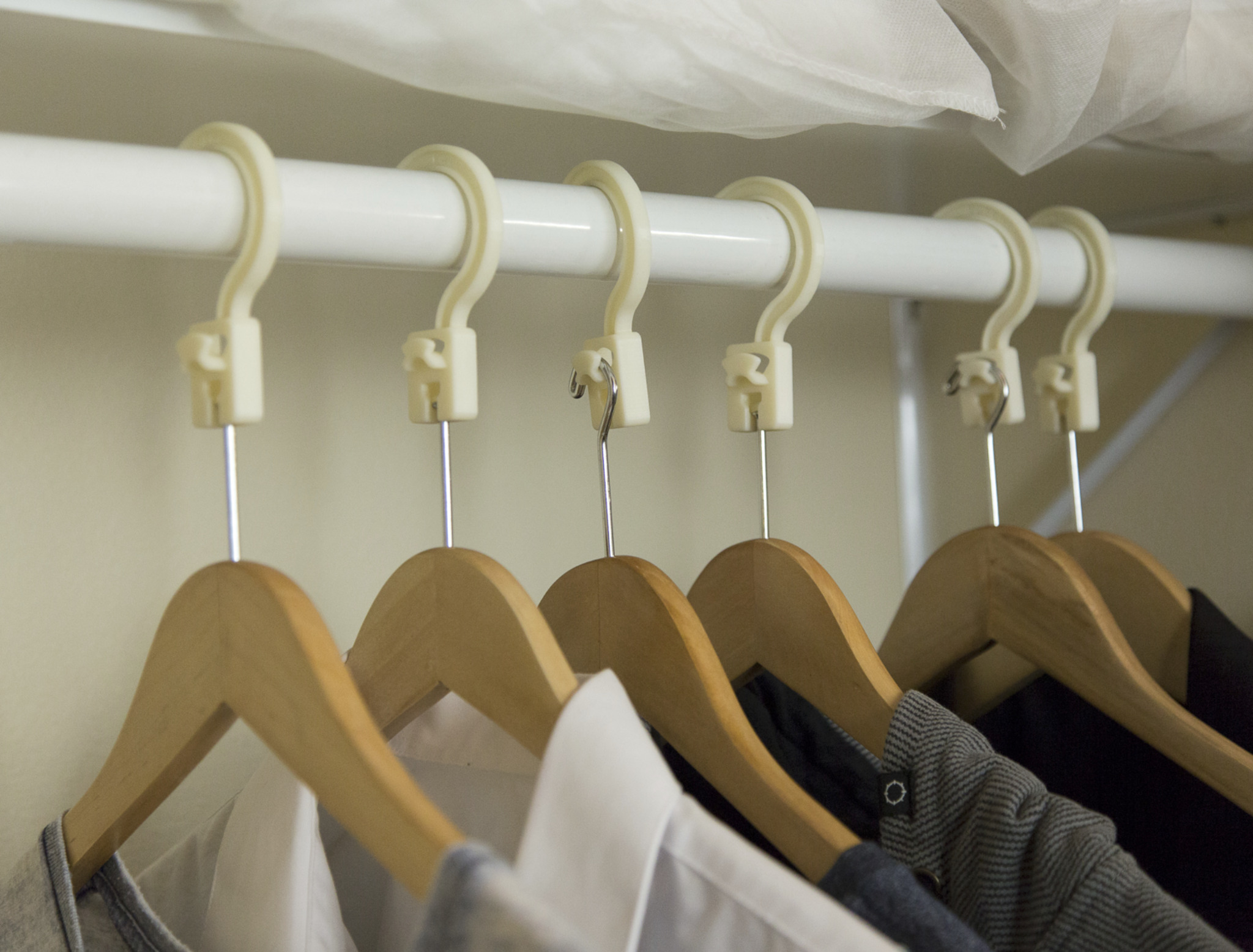 Converted hotel hangers in a closet