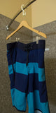 Anti Theft Hotel Hanger - swimsuit hanging in bathroom shower with the CovertAHanger